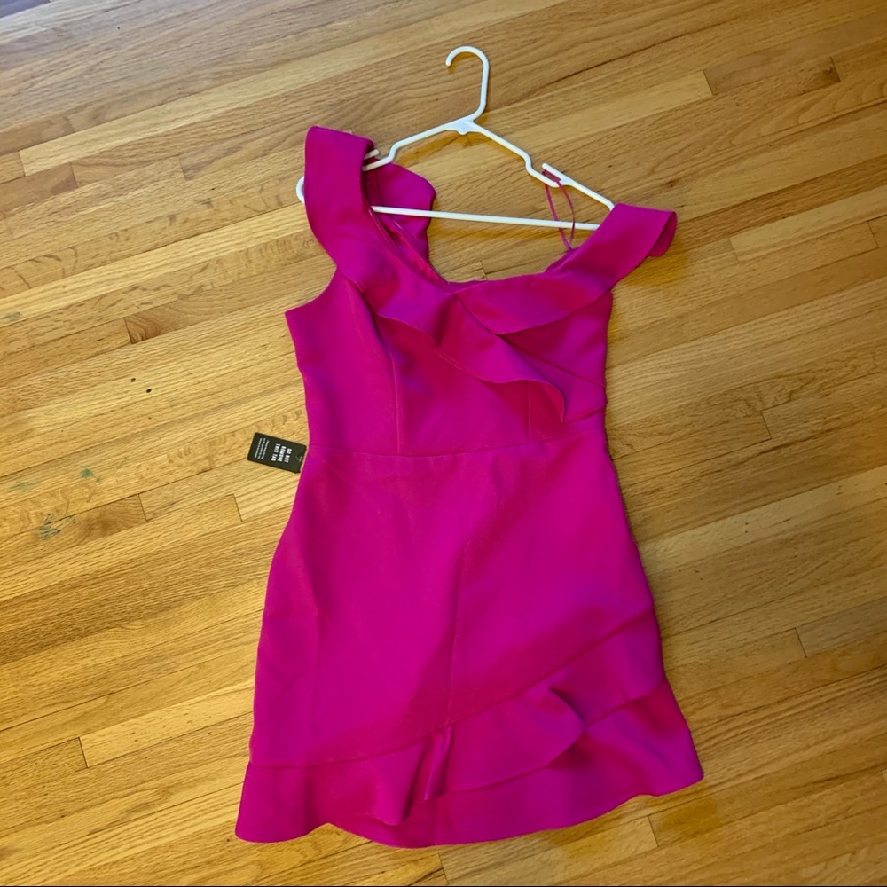 One shoulder ruffle dress.